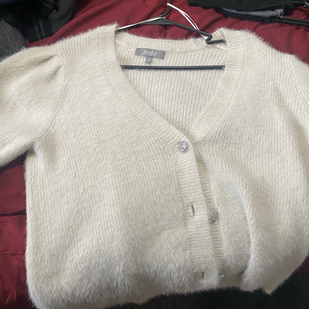 fuzzy, white cardigan
